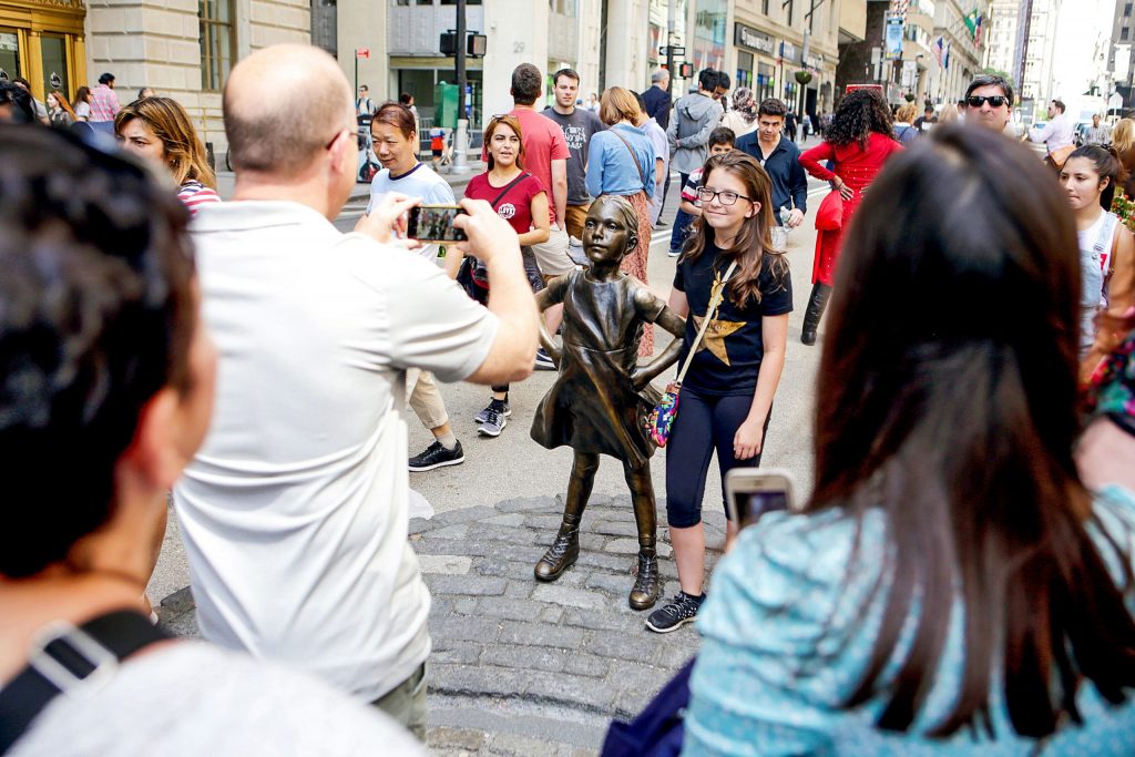 Taking pictures with the Fearless Girl