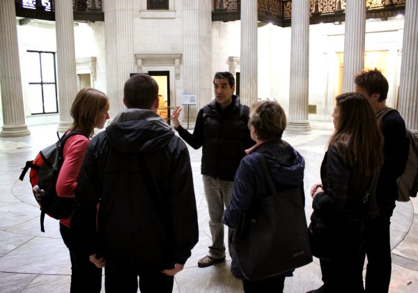 Tour group inside Wall Street