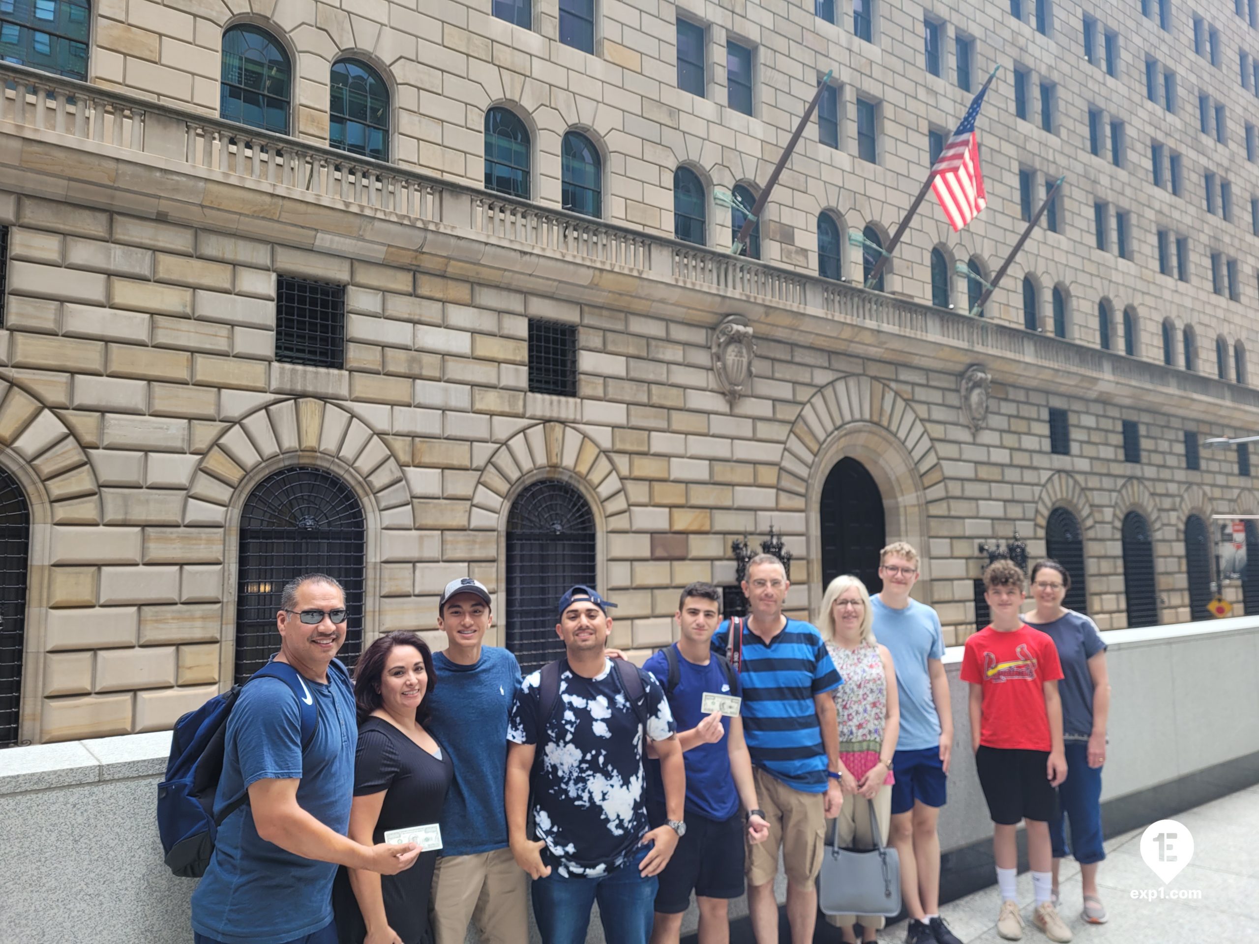 Wall Street Insider Tour group photo in front of the Federal Reserve
