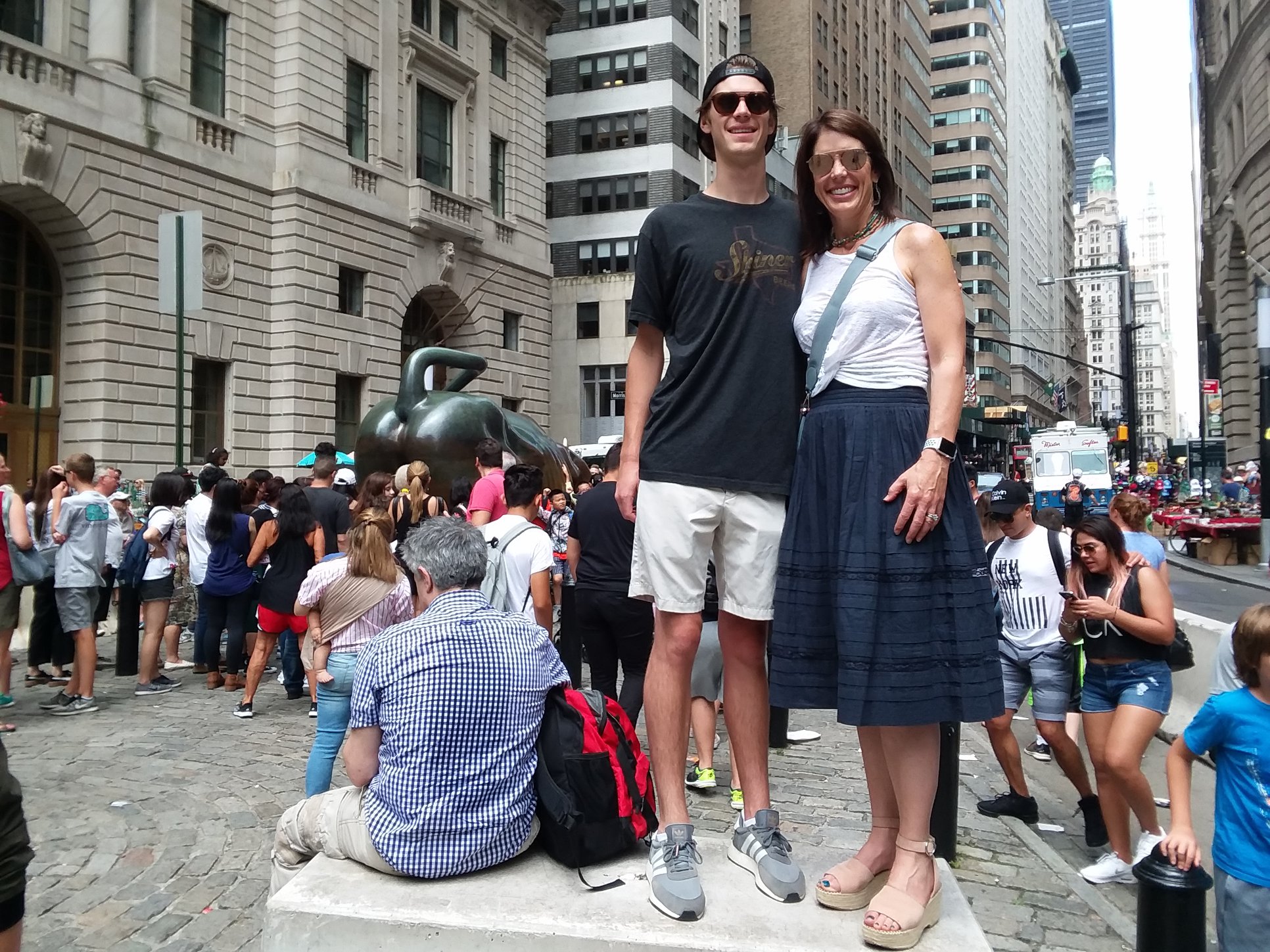 Couple posing with the Charging Bull