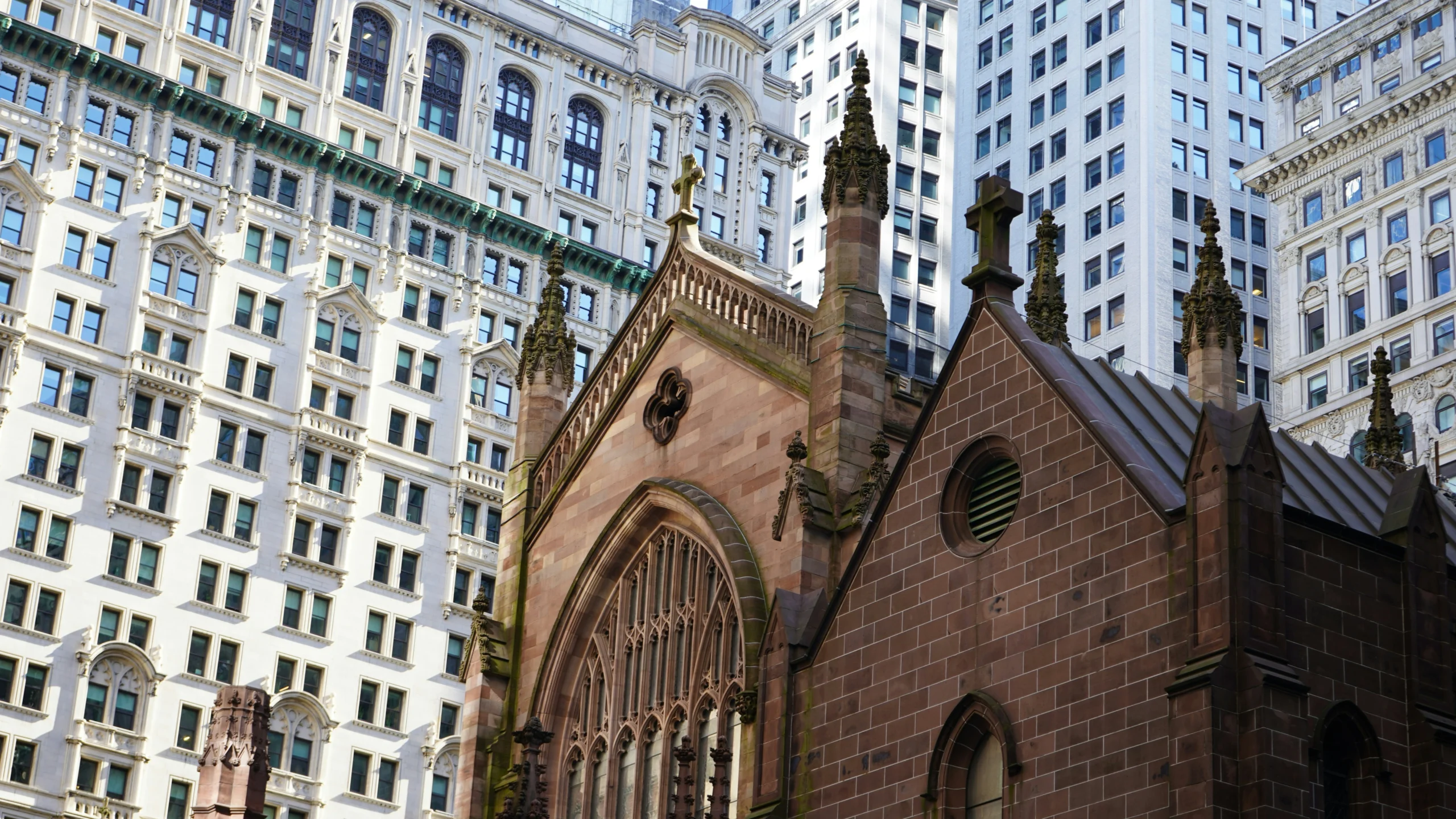 Close up of Trinity Church gothic architecture during Private Wall Street with a Trader tour